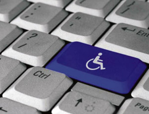 Teclado accesible con símbolo para personas con discapacidad.